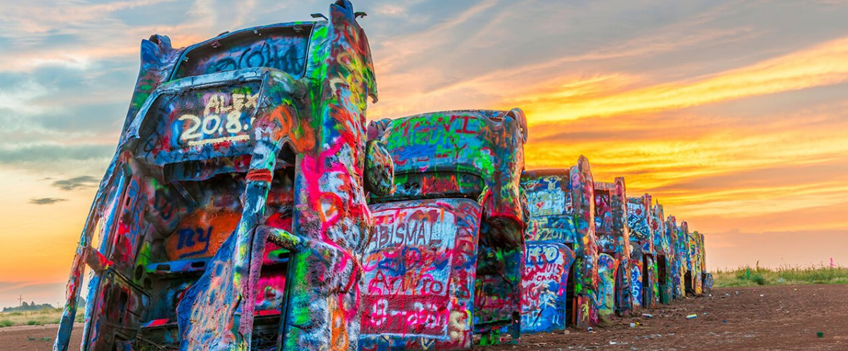 Cadillac Ranch Amarillo Texas Colorful vintage Cadillacs buried nose-down in the Texas desert at Cadillac Ranch