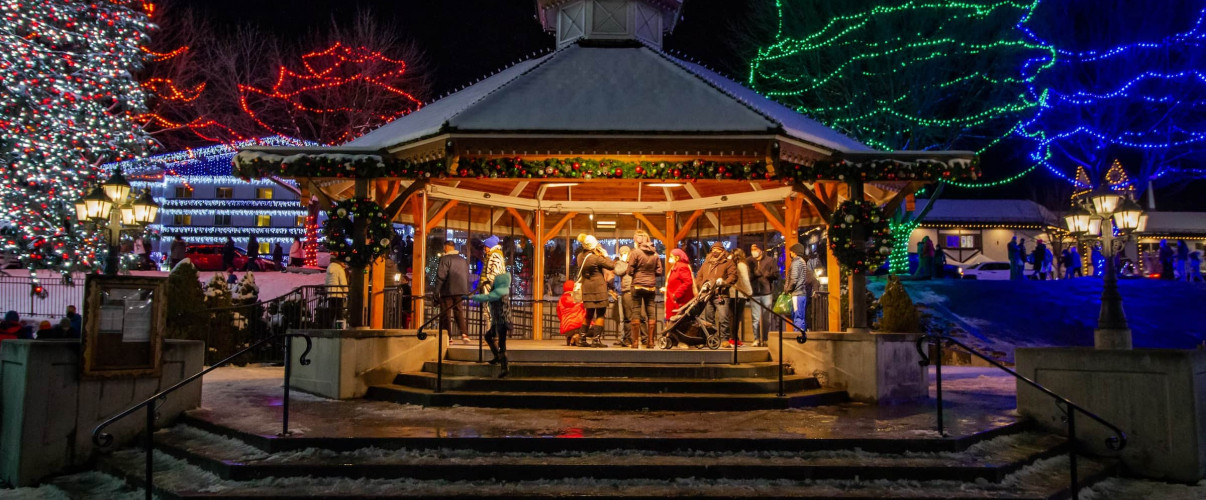 Leavenworth Washington Christmas lights Bavarian-style buildings in Leavenworth, Washington decorated with thousands of Christmas lights against a snowy backdrop