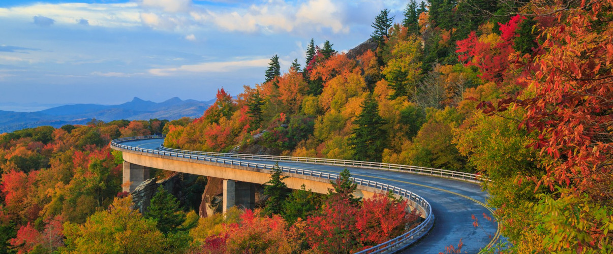 Winding road along the Blue Ridge Parkway with colorful autumn foliage