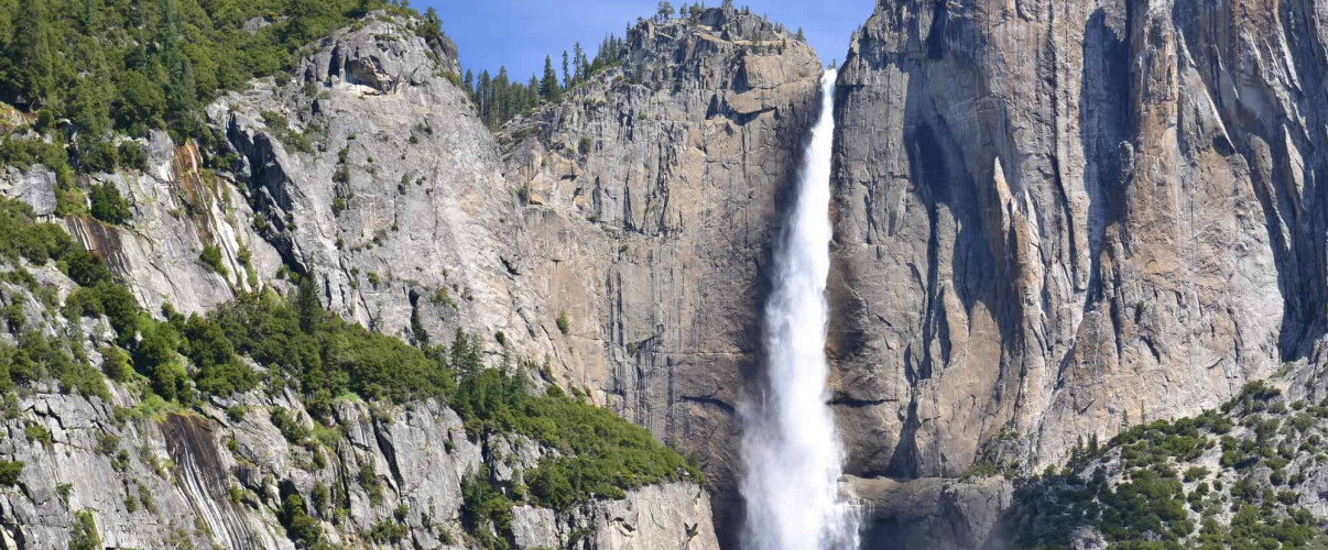 Yosemite Falls cascading down granite cliff in Yosemite National Park