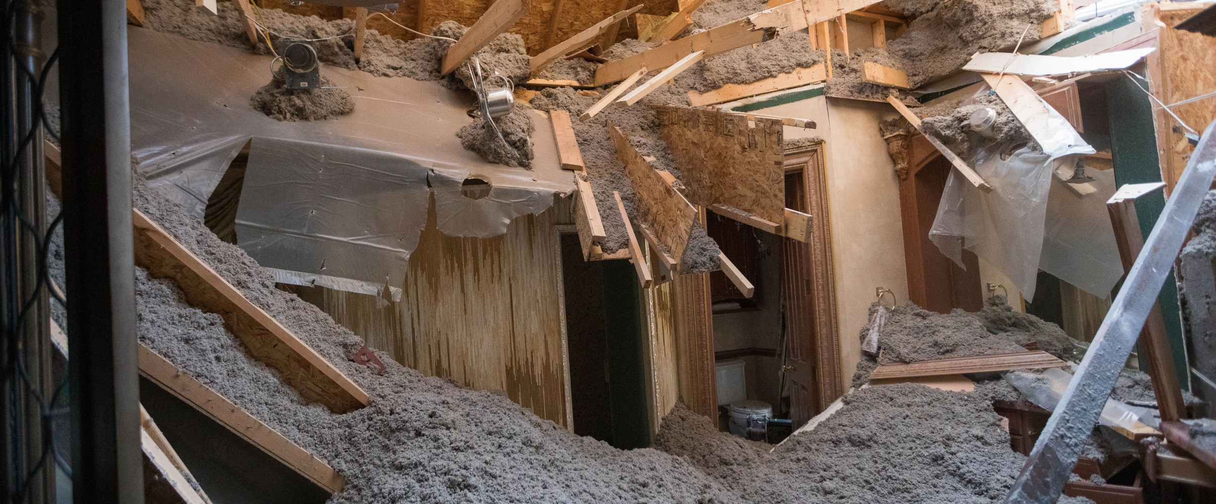 Alaska earthquake damage Damaged road from a major earthquake in Alaska showing large cracks and displacement