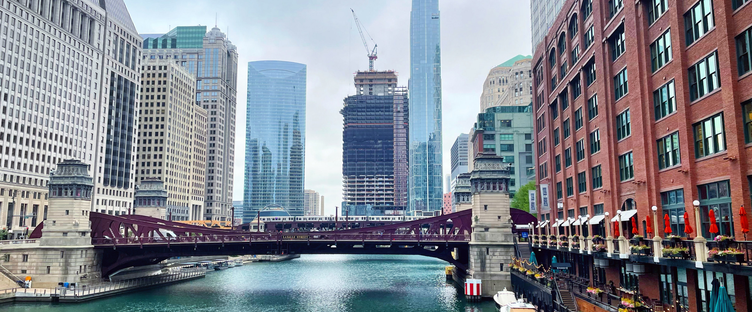 Chicago skyline with flags blowing in strong winds