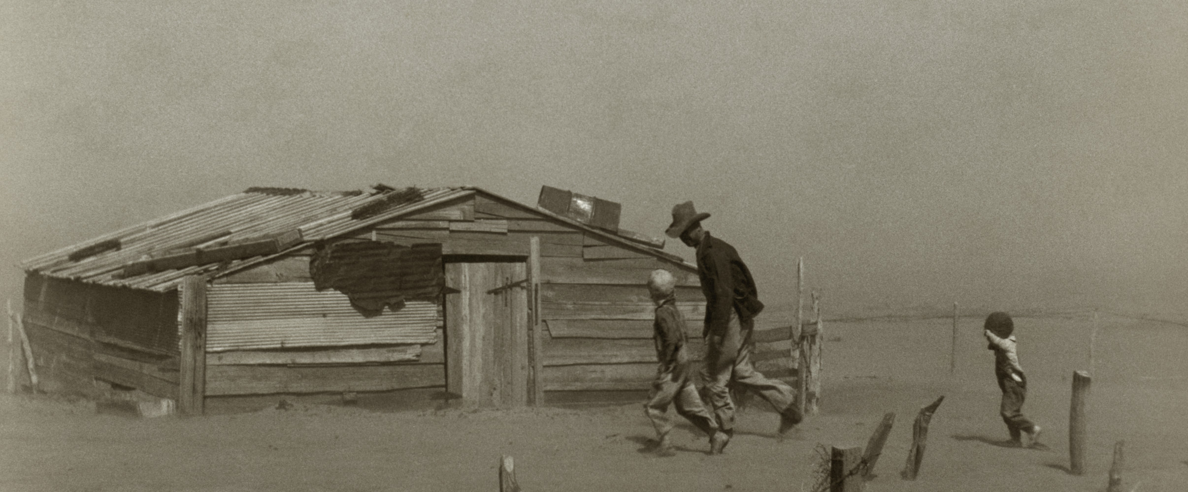 Dust bowl storm 1930s Massive dust storm approaching a farm during the 1930s Dust Bowl