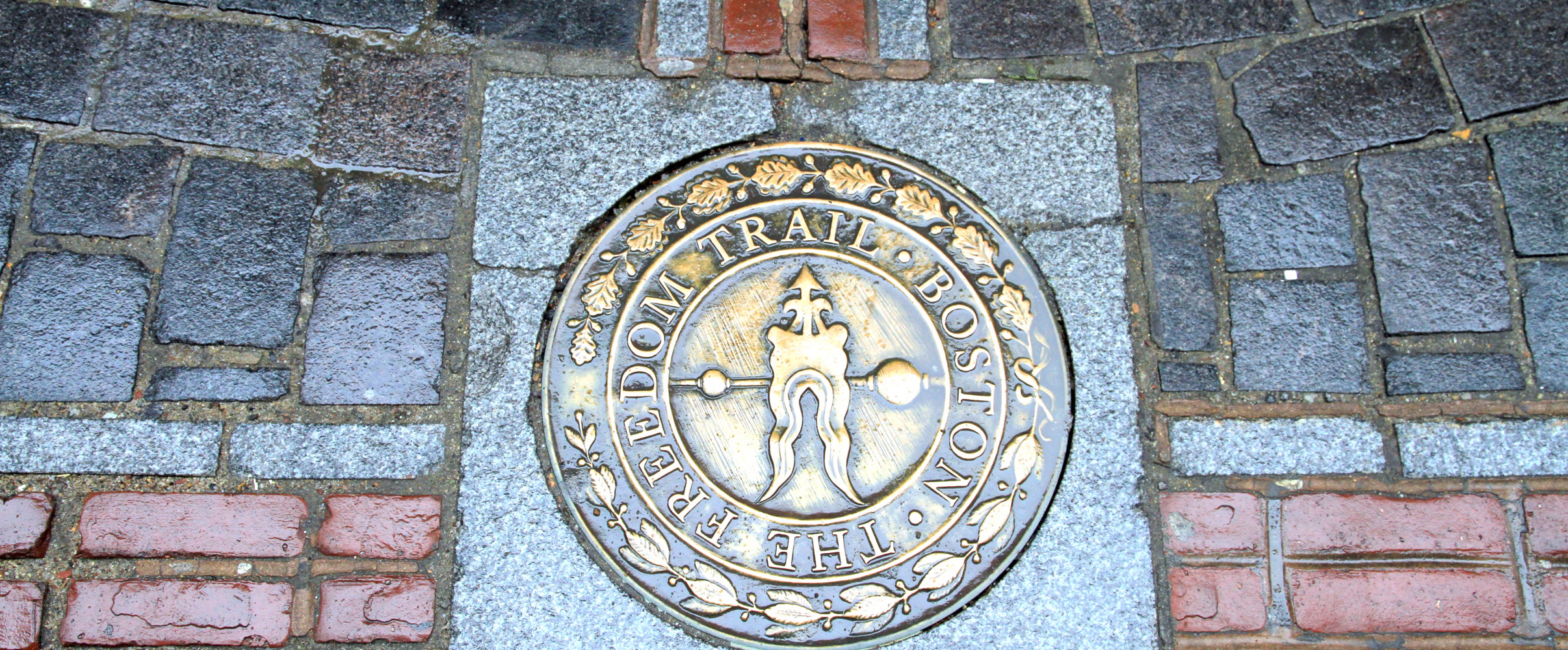 Historic Boston Massachusetts Freedom Trail The red brick path of Boston's Freedom Trail winding through historic buildings