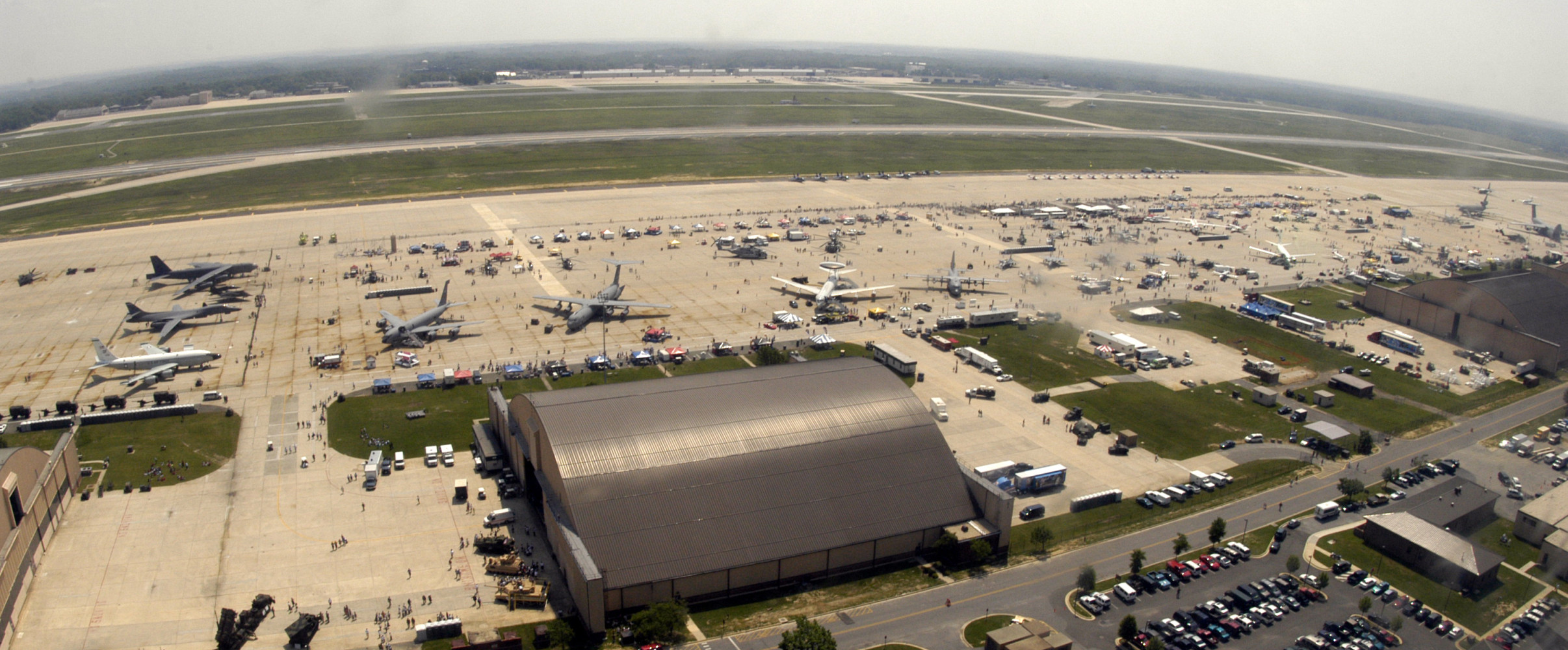 Aerial view of a sprawling military installation with buildings and infrastructure