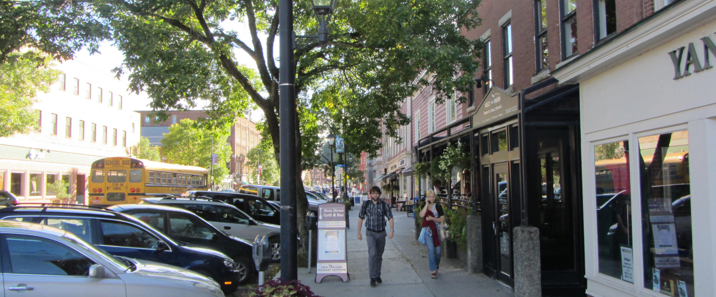 Downtown Montpelier, Vermont with the gold-domed State House visible among trees