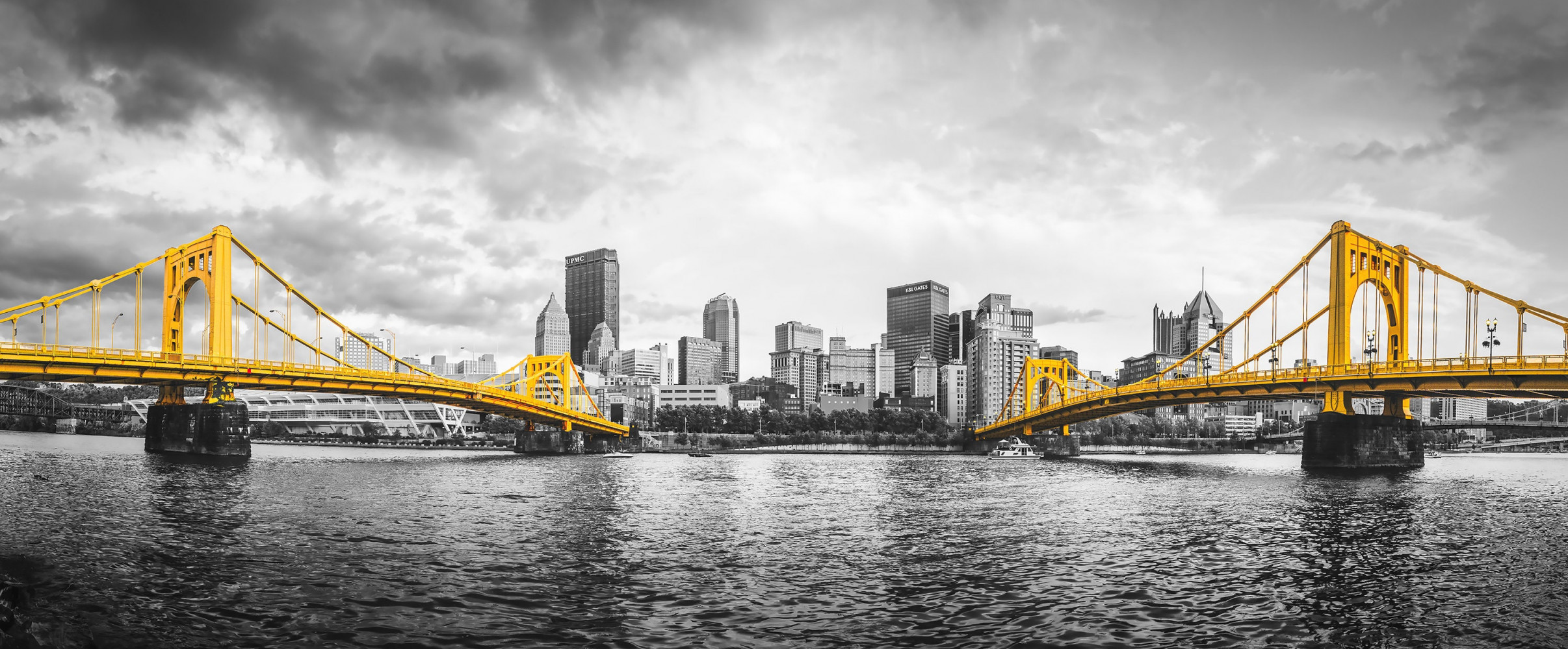 Pittsburgh skyline with bridges Pittsburgh skyline featuring multiple bridges crossing three rivers with downtown buildings in background