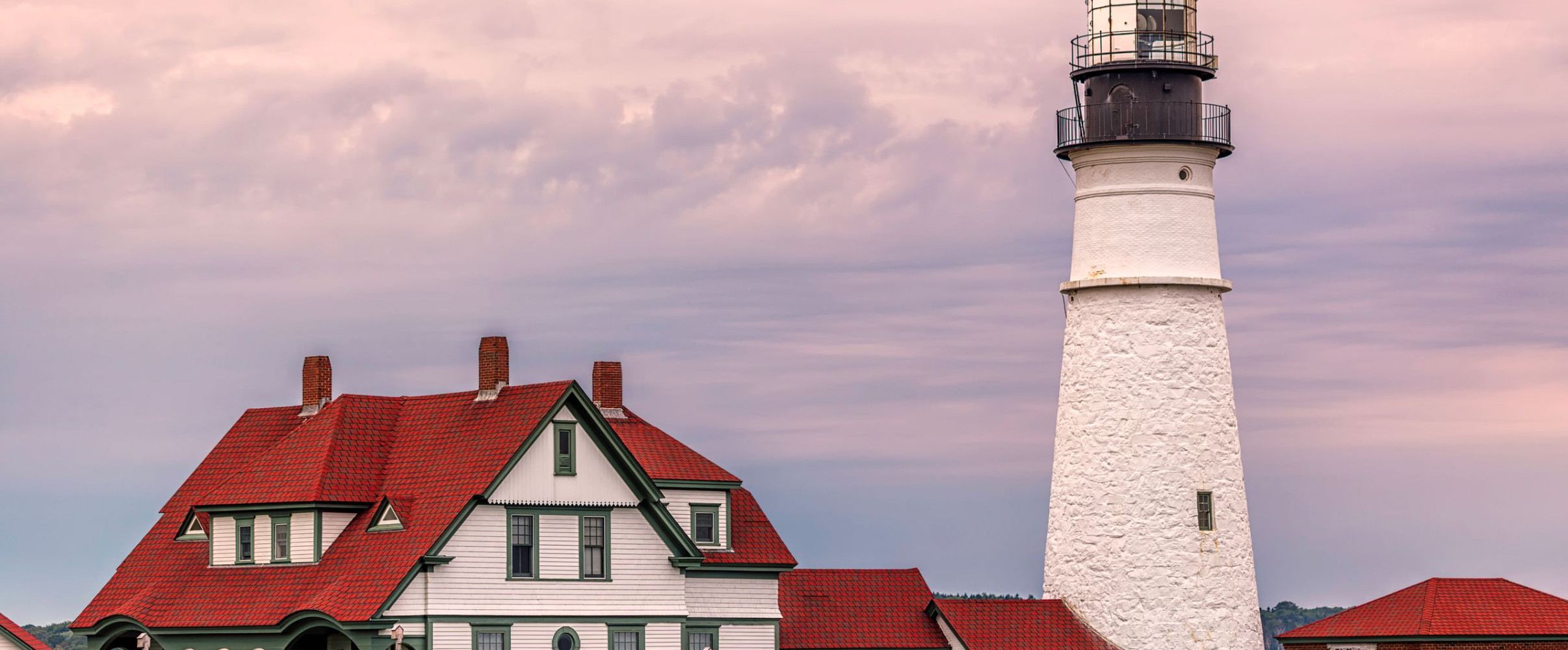 Portland Head Light lighthouse perched on rocky Maine coastline