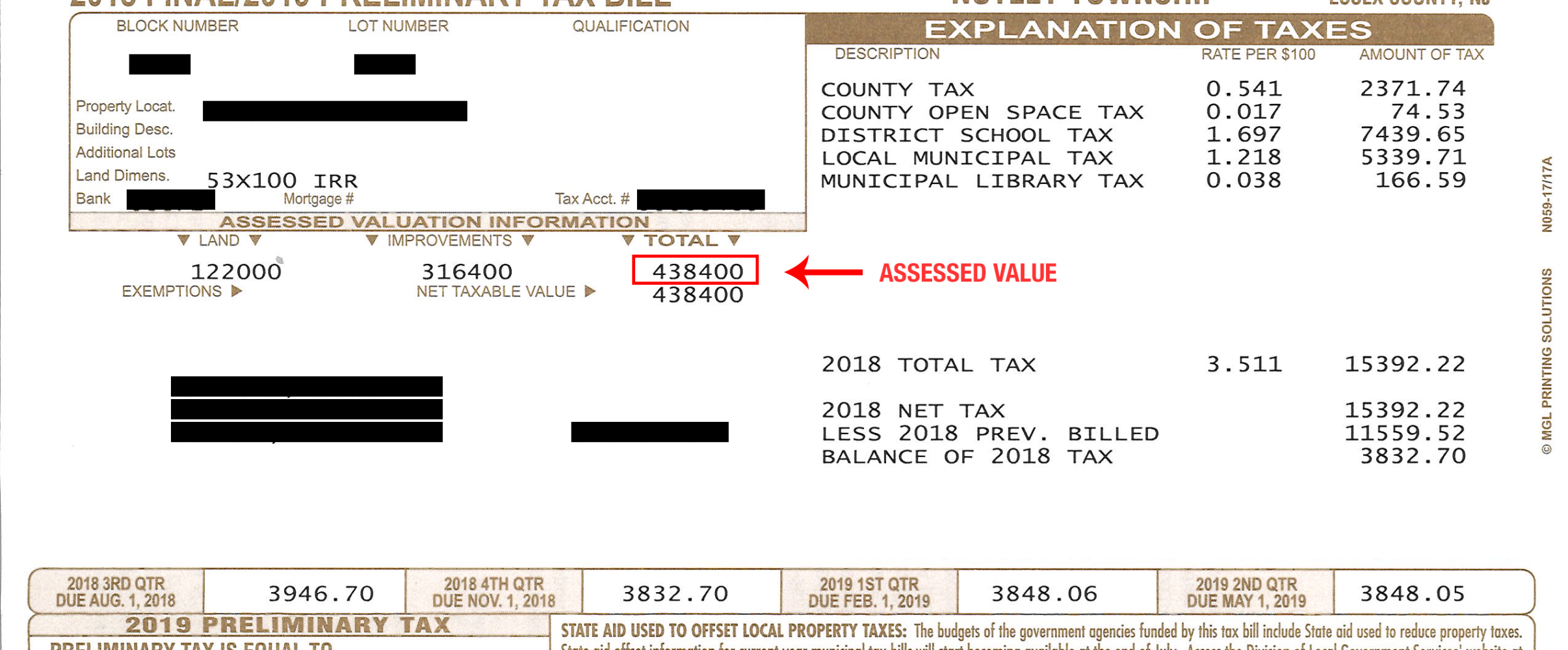 Property tax calculator on desk with home documents
