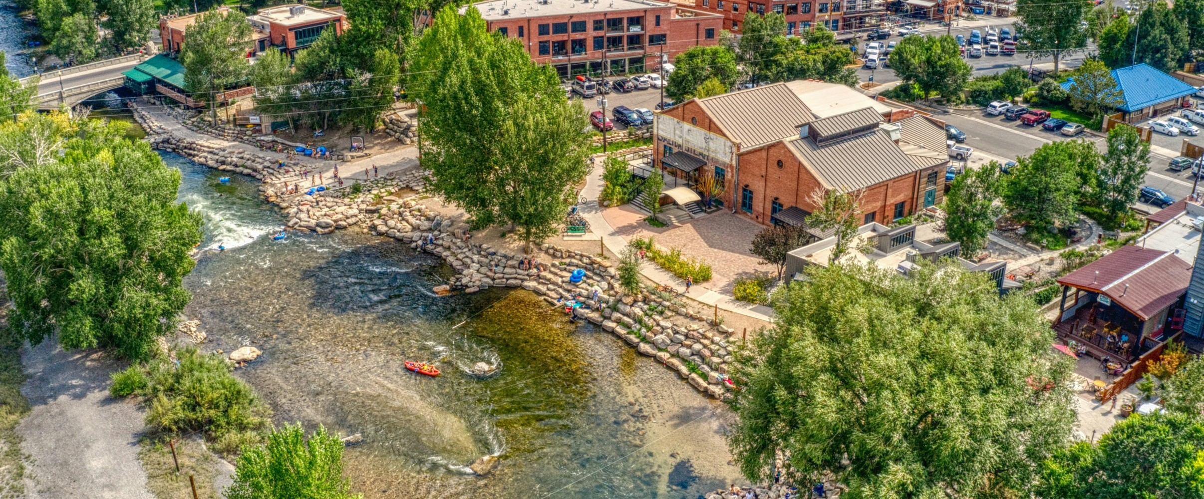 Picturesque riverside town with historic buildings along a calm river