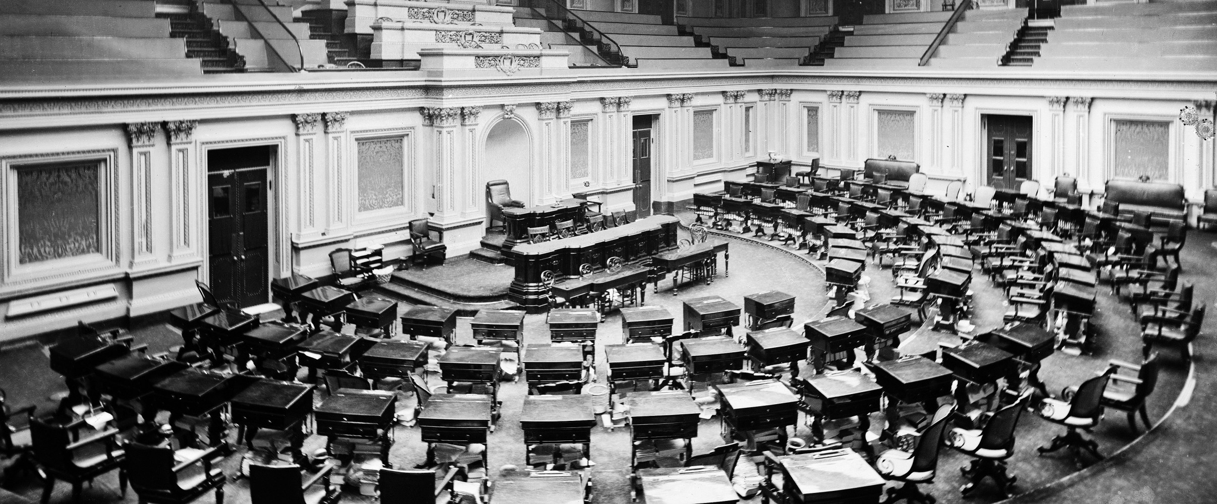 United States Senate chamber The United States Senate chamber with empty seats and the American flag
