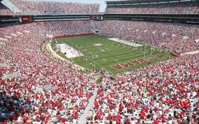 Packed NFL stadium with thousands of fans watching an American football game