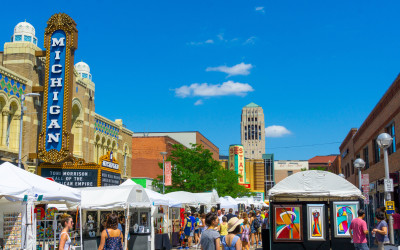 Vibrant downtown Ann Arbor with University of Michigan architecture in background