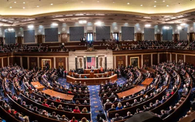 Interior view of the United States Senate chamber with rows of desks