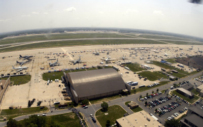 Aerial view of a sprawling military installation with buildings and infrastructure