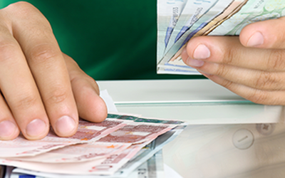 Cash register with money and hourly wage calculation