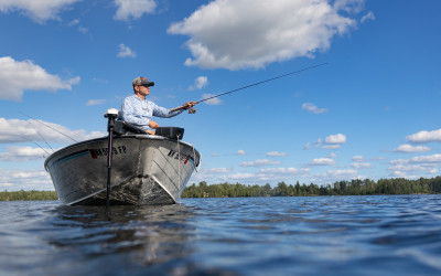 Aerial view of Minnesota's numerous interconnected lakes surrounded by forests