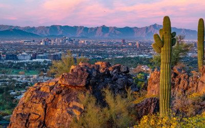 Phoenix skyline against brilliant blue sky with sunshine