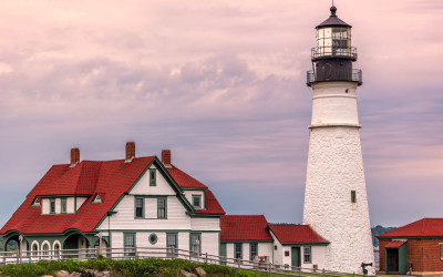 Portland Head Light lighthouse perched on rocky Maine coastline