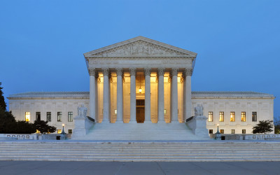The iconic neoclassical facade of the United States Supreme Court building in Washington DC