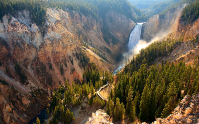 Historic view of Old Faithful geyser erupting in Yellowstone National Park