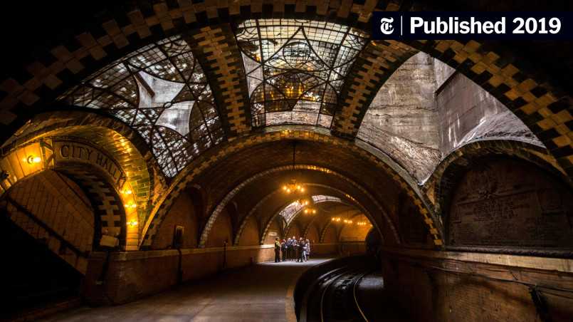 Ornate tiled ceiling arches in historic City Hall subway station