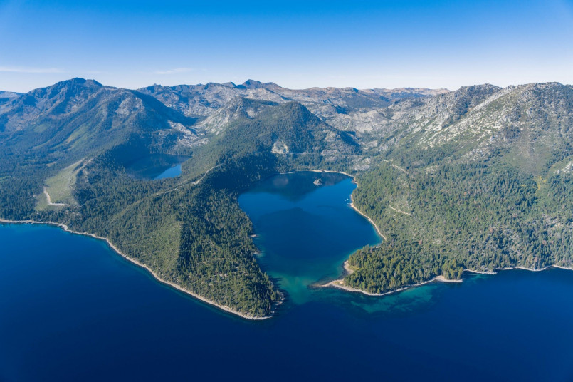 Lake Tahoe emerald bay aerial view Aerial view of Emerald Bay at Lake Tahoe with turquoise blue waters and surrounding mountains