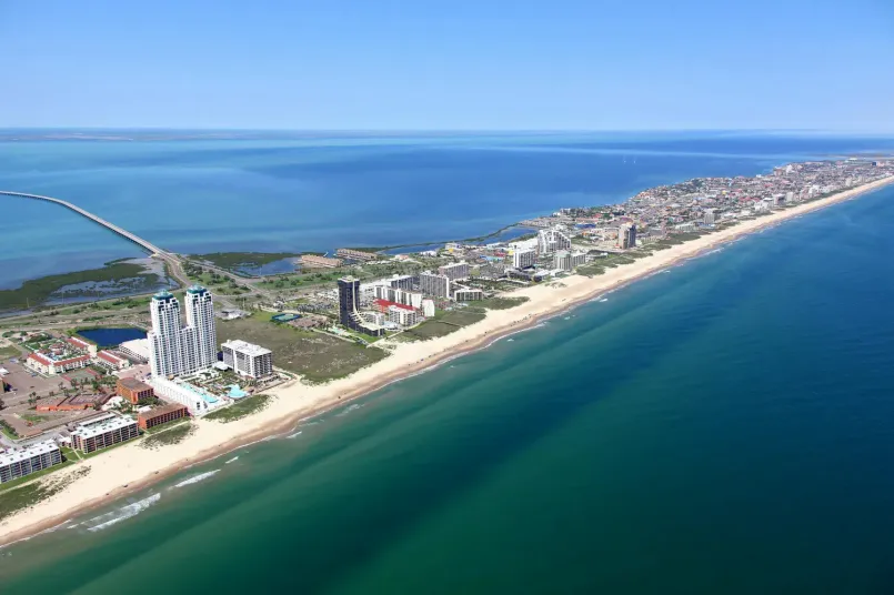 South padre island texas aerial beach view Aerial view of South Padre Island's white sand beaches and turquoise waters