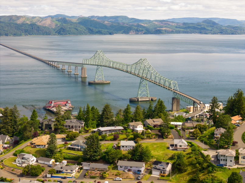 Astoria Megler Bridge Columbia River Oregon Washington Astoria-Megler Bridge spanning the Columbia River with mountains in the background