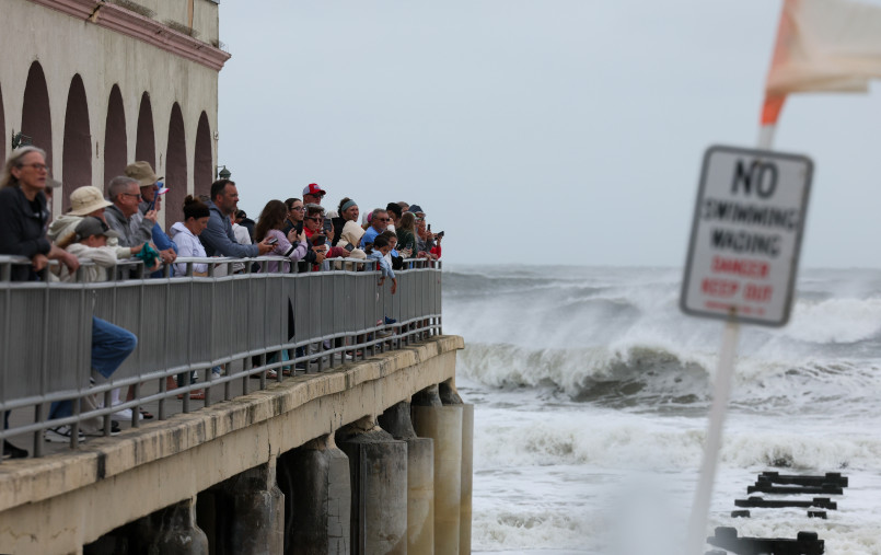 Atlantic City boardwalk flood damage Atlantic City boardwalk with flood damage and beach erosion visible