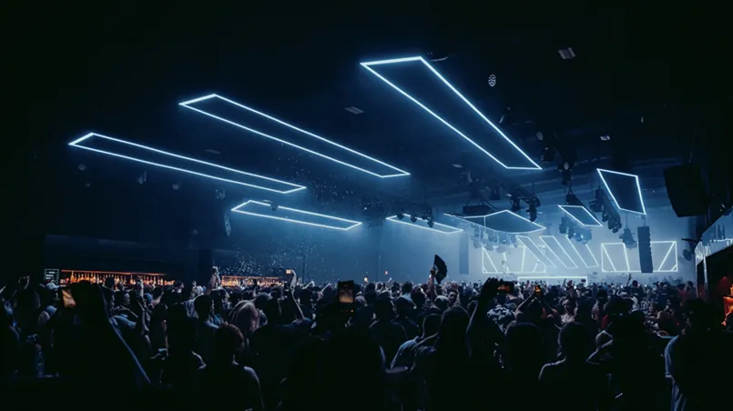 Austin Texas outdoor concert Crowded outdoor music festival in Austin with skyline visible in background
