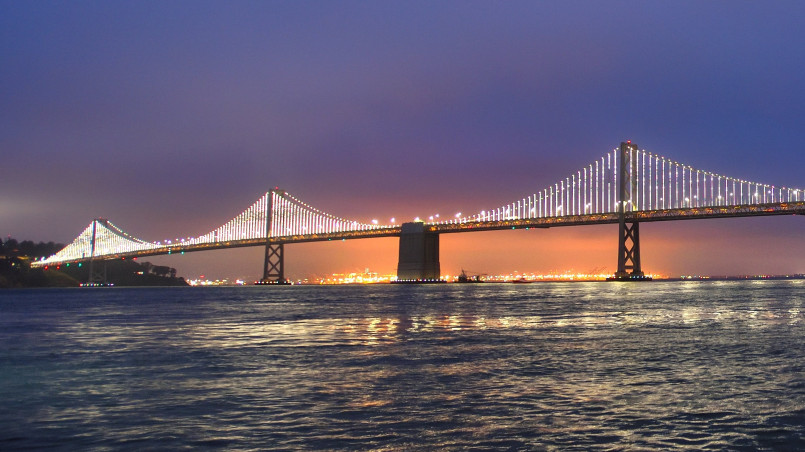 Bay Bridge at night with LED light installation illuminating the span