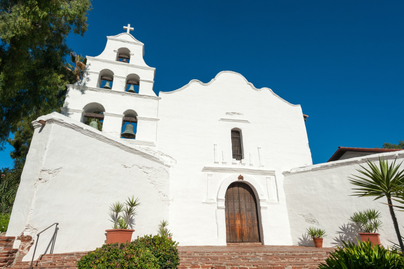 California spanish missions Historic Spanish mission with white walls and bell tower in California
