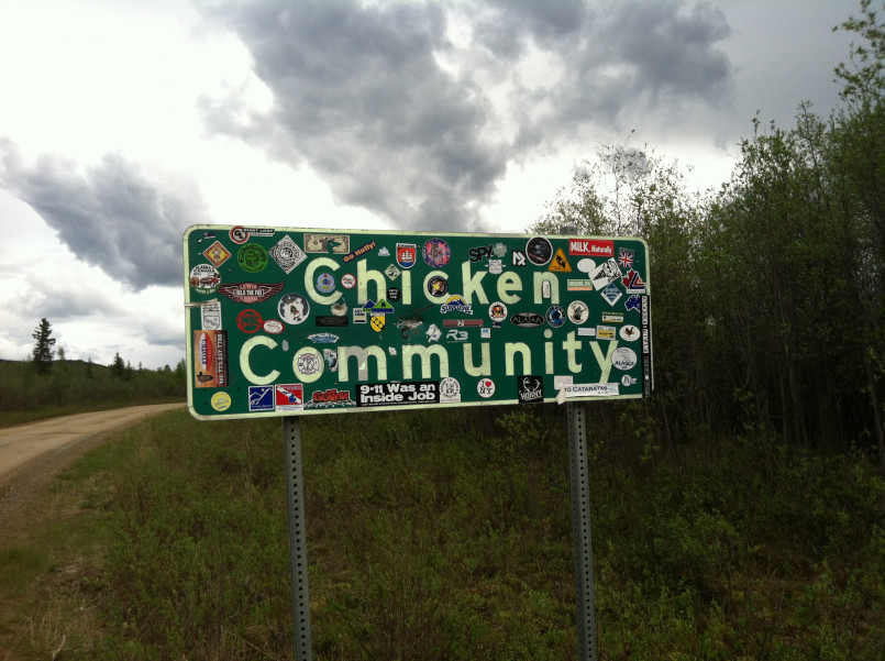Chicken Alaska town sign Rustic wooden sign for the town of Chicken, Alaska with population count