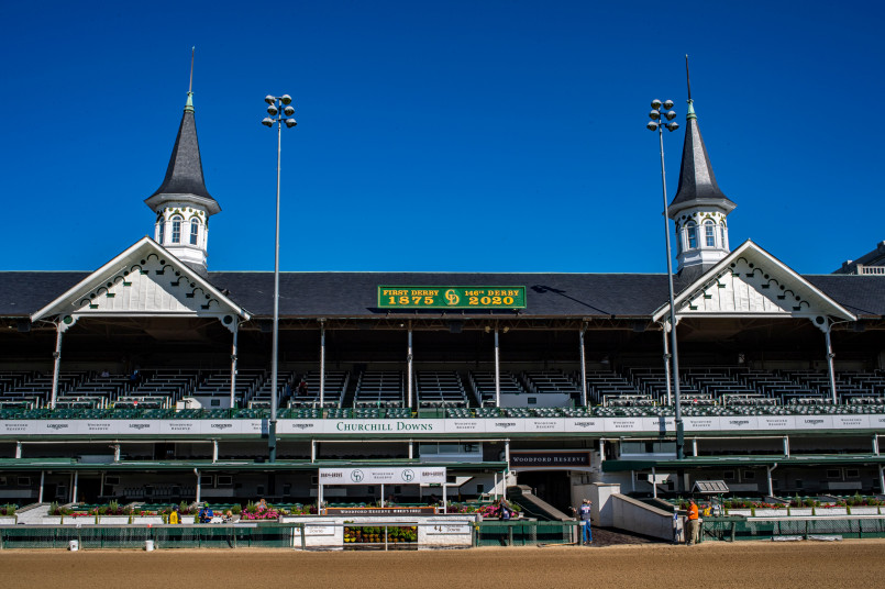The iconic twin spires of Churchill Downs with large crowd during Kentucky Derby day