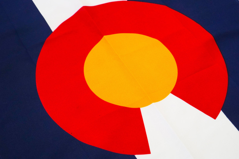 Colorado state flag with red C and golden circle