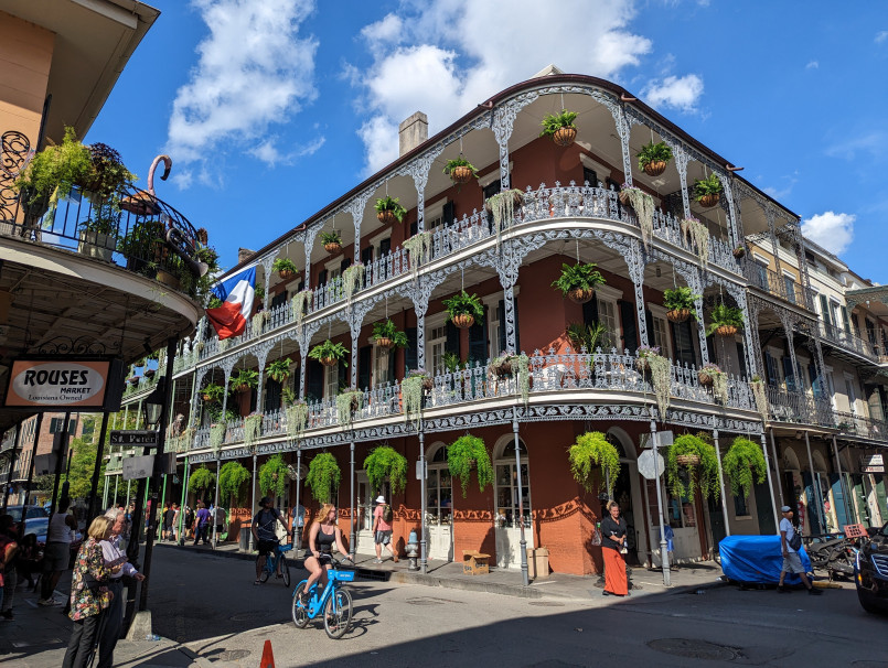 Colorful buildings with ornate wrought-iron balconies in the French Quarter of New Orleans