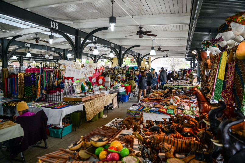 Colorful food stalls with Creole and Cajun specialties at the French Market in New Orleans