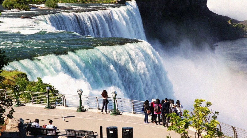 Colorful neon signs of tourist attractions along the main street in Niagara Falls, New York