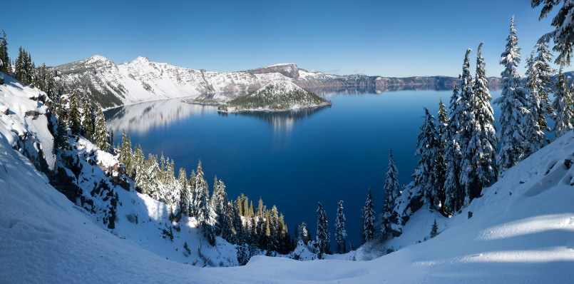 Aerial view of Crater Lake's deep blue water within Mount Mazama's caldera in Oregon
