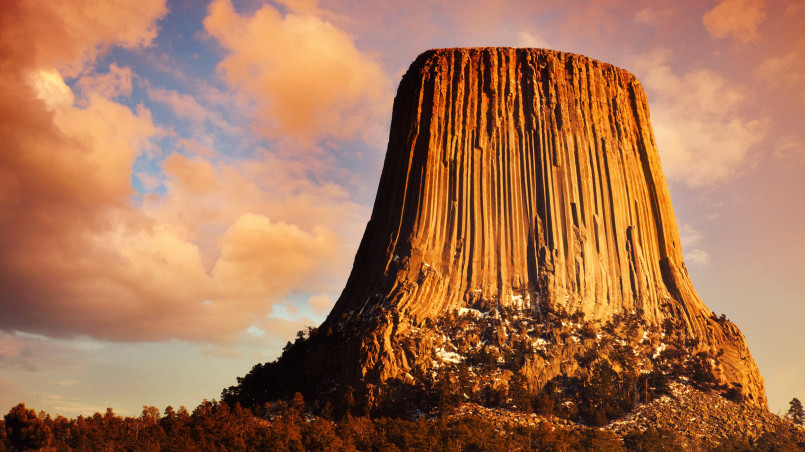 Devils Tower Wyoming volcanic formation The dramatic columnar formation of Devils Tower rising above the surrounding landscape