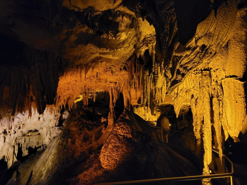 Dramatic limestone formations inside Mammoth Cave with stalactites and stalagmites