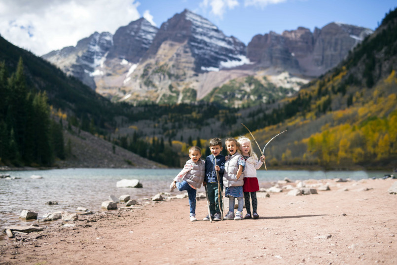 family enjoying scenic road trip 12 Unforgettable Family Road Trips Across America (2024 Guide)