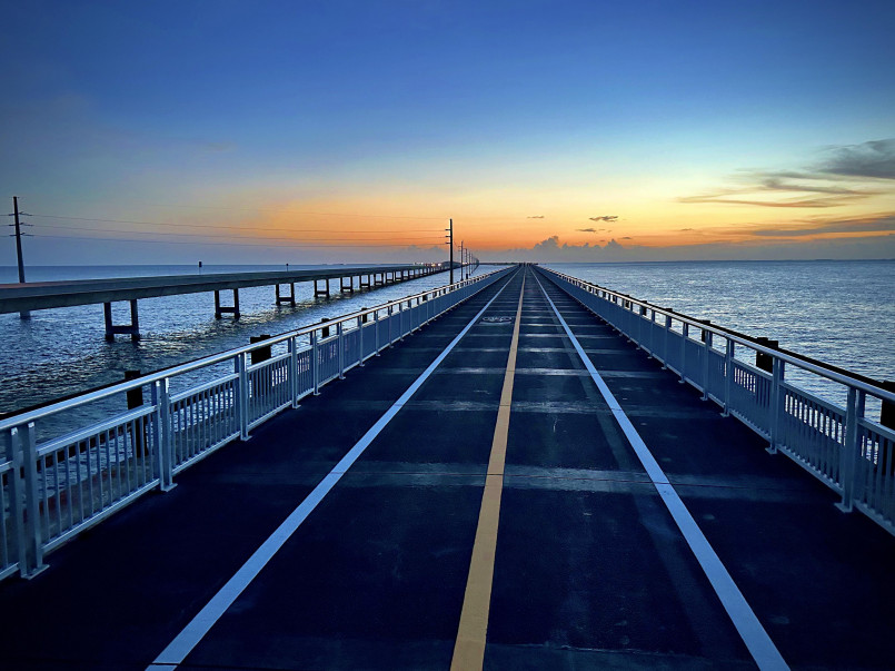 Family seven mile bridge florida keys Family viewing ocean from Seven Mile Bridge in Florida Keys