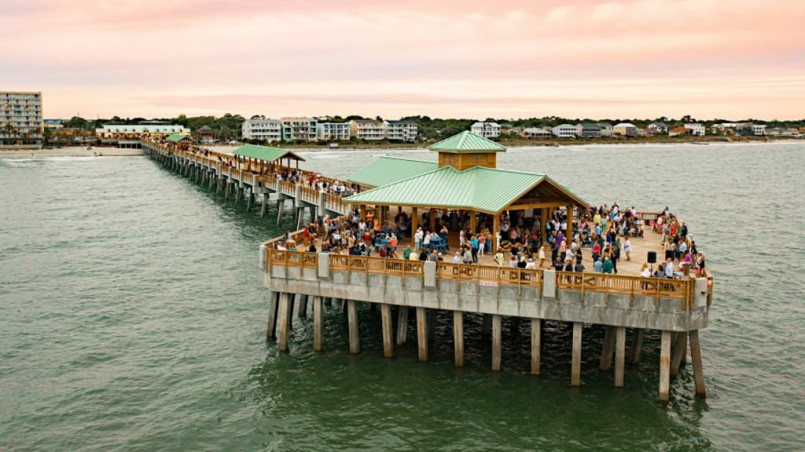 Folly beach charleston south carolina pier Folly Beach pier extending into the Atlantic near Charleston