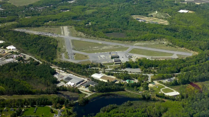 Aerial panorama of Fort Liberty showing extensive facilities and training areas