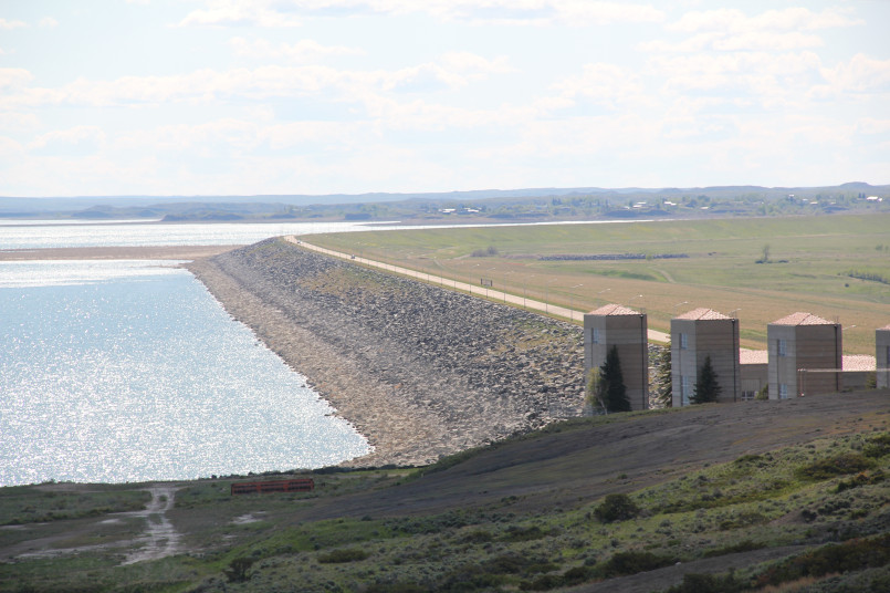 Historic Fort Peck Dam with art deco spillway structure and long earthen embankment