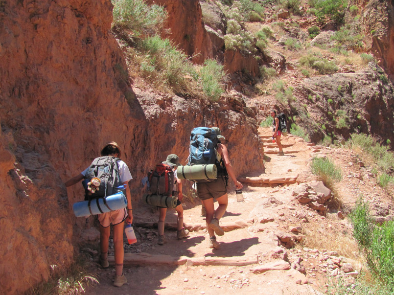 Grand Canyon Bright Angel Trail hikers Hikers on switchbacks of the Bright Angel Trail with vast Grand Canyon views