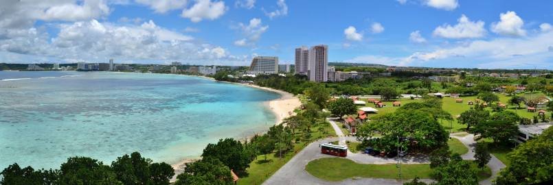Aerial view of Tumon Bay with luxury resorts along sandy beach