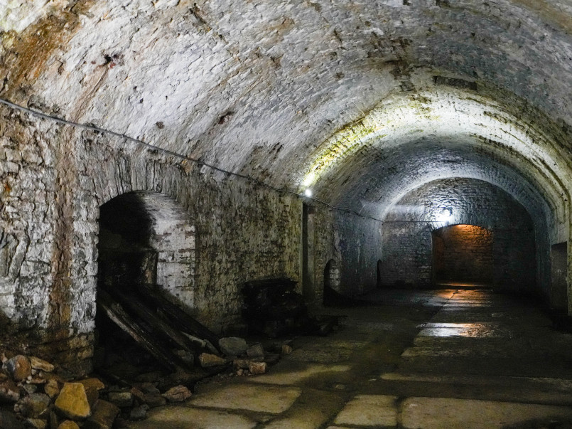 Stone archway entrance to historic underground beer lagering cellar